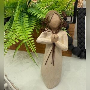 Elegant Cream Figurine with Brown Accents